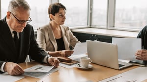 Man and woman reviewing documents