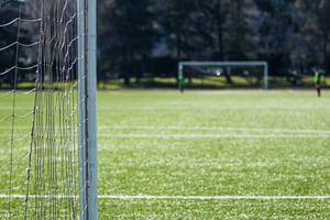 soccer-field-goal-and-players-on-sunny-day-2026-03-16-22-56-47-utc (4)